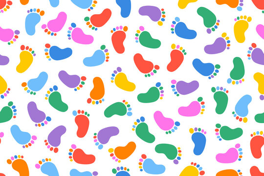 Fun colorful baby footprint  seamless pattern. Cute doodle with little baby footprint in rainbow color.