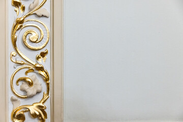 Classic luxury interior details, golden floral pattern elements