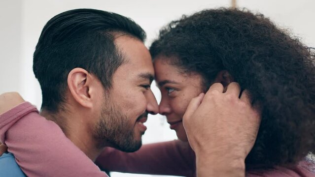 Love, happy and couple hugging for care, bonding and romance together in the morning. Smile, connection and young man and woman from Colombia embracing for comfort and intimacy in modern apartment.