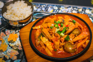 Original Spicy Stir fried Chicken with baby potatoes and served with rice