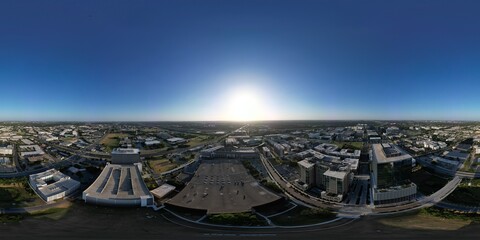 Sunset over the city and hill country. Clear blue skies. Orange sun. Vistas and panoramas.