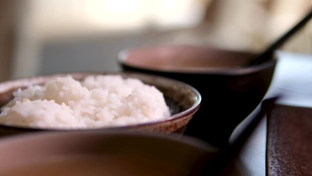  Miso soup is traditional Japanese soup made primarily of miso paste, dashi broth, and additional ingredients such as vegetables, seaweed. and tofu