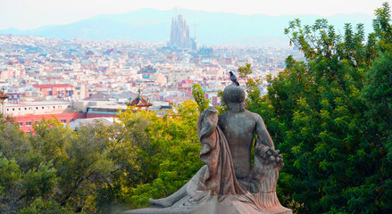 Barcelona statue with cathedral in distance