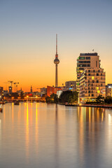 The river Spree in Berlin at twilight with the famous TV Tower in the back