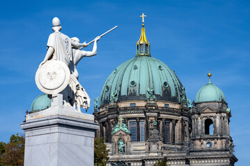 The Berlin Cathedral with a beautiful sculpture on a sunny day