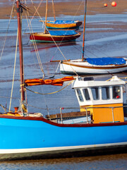 Boats at Meol beach The Wirral group of boats on there moorings at low tide