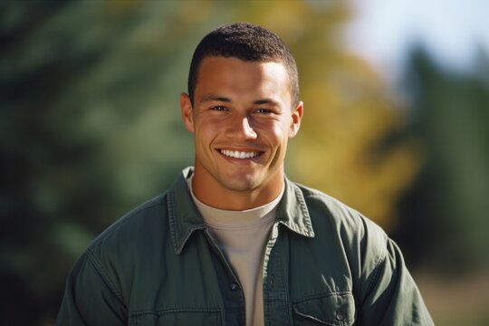 Portrait Of A Happy Mixed-race Man On A Blurred Background. Close-up Shot.