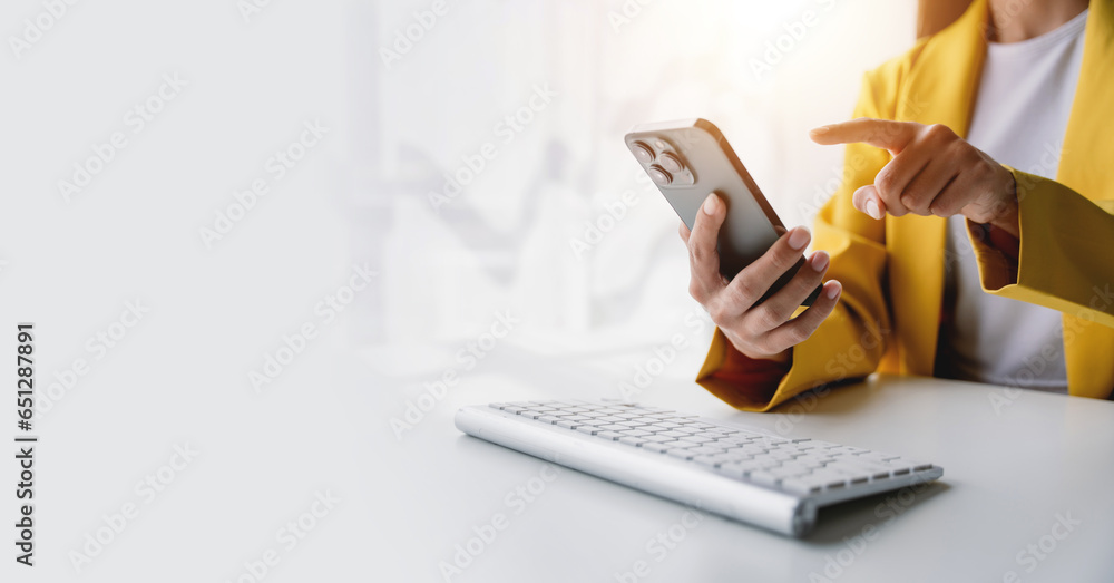 Wall mural type search information from the internet network. businessman working with smartphone, tablet and l