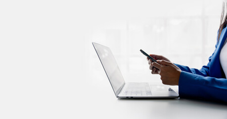 Type search information from the Internet network. Businessman working with smartphone, tablet and laptop computer on table in office. network concept