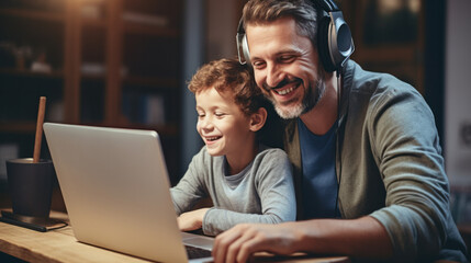 Head shot smiling young father in eyeglasses cuddling small preschool kid, watching funny video on computer. Happy single dad shopping online on laptop with adorable little child girl at home.