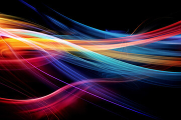 Fototapeta na wymiar Abstract image of bright colored light streaks of red, orange and blue in motion on a black background