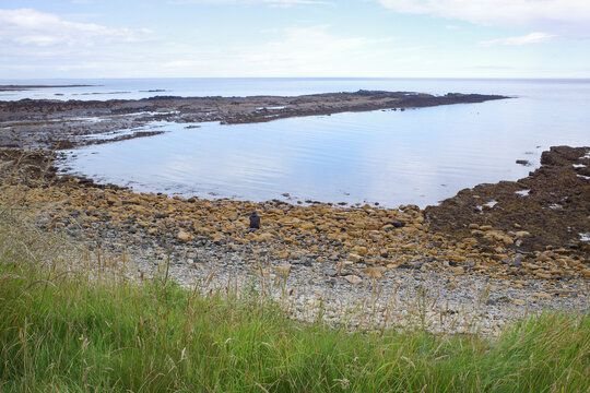 Beadnell, England - 12 July 2023: Views of the North sea coast from Beadnell, Northumberland