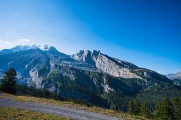 Obraz premium Oeschinensee, Switzerland - July 27, 2022 - View from Oeschinensee, Switzerland in the town of Kandersteg.