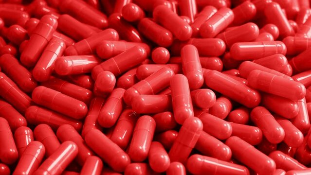 Drug Capsules Poured Into Pile Rotating