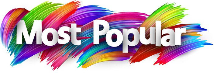 Most popular paper word sign with colorful spectrum paint brush strokes over white. © Vjom
