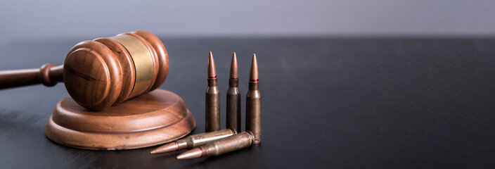 judge hammer gavel with bullets