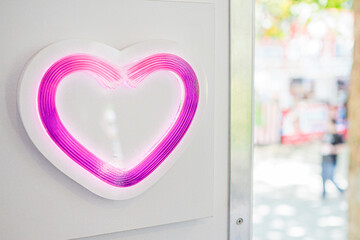 Neon Light in Shape of Heart on the wall