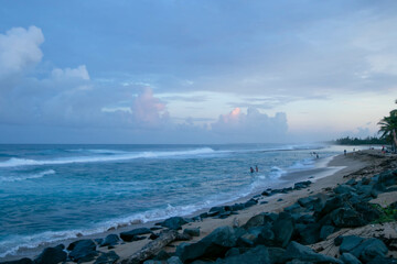 Beach in Pinones area near San Juan as sunset starts to set in. Blue skies