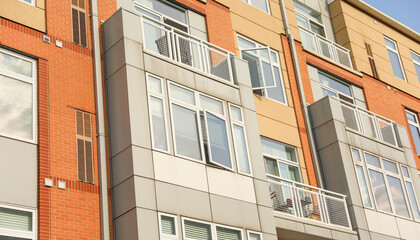 Fototapeta premium skyscraper in a bustling city, symbolizing innovation and growth in the modern commercial real estate industry. Dynamic, glassy exterior reflects urban vitality