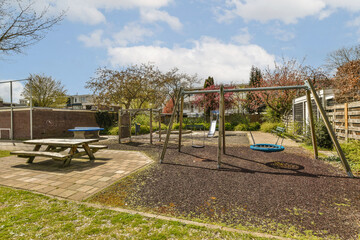 Playground with picnic table and play equipment