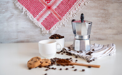 Coffee set of espresso boiler with grounded and beans of coffee on white background with arabick...
