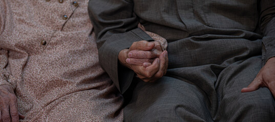 Arabic old couples love each other while holding their hands