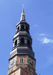Tower of St. Catherine's Church in Hamburg with the golden crown of the infamous pirate Klaus...