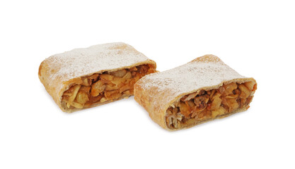Delicious cut strudel with apples, nuts and raisins isolated on white