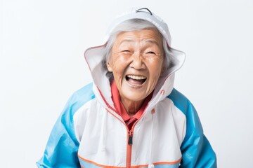 Medium shot portrait photography of a 100-year-old elderly Vietnamese woman wearing a lightweight windbreaker against a white background