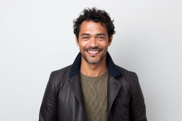 Medium shot portrait photography of a Peruvian man in his 30s against a white background