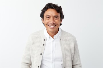 Lifestyle portrait photography of a Peruvian man in his 40s against a white background
