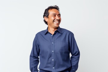 Group portrait photography of a cheerful Peruvian man in his 40s against a white background