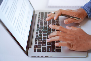 Man Typing on Laptop Keyboard, Creative Blog Writing Concept
