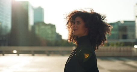 Business, black woman and walking outdoor in city building with thinking and smile for morning travel or journey outdoor. Happy, person with afro and corporate worker moving to work in urban town