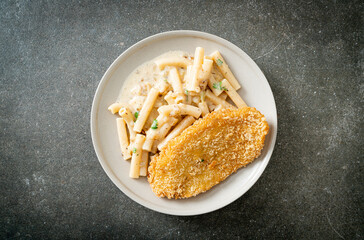 quadrotto penne pasta white cream sauce with fried fish