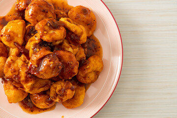 fried meatballs with spicy dipping sauce