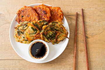 Pajeon or Korean pancake and Korean Kimchi pancake or Kimchijeon on white background