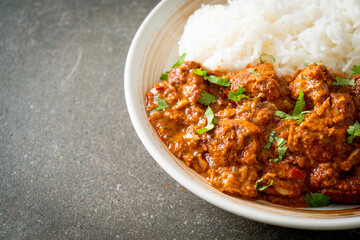 chicken tikka masala with rice on plate