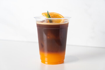 espresso with orange juice in glass