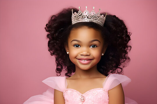 studio portrait of little black girl wearing pink princess costume