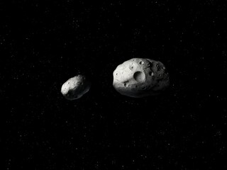Two asteroids in space. Asteroid with impact craters with a satellite.