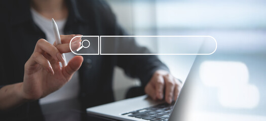 Data Search Technology SEO Search Engine Optimization concept. Woman's hands typing on laptop computer keyboard surfing the internet to search for information on web browser.