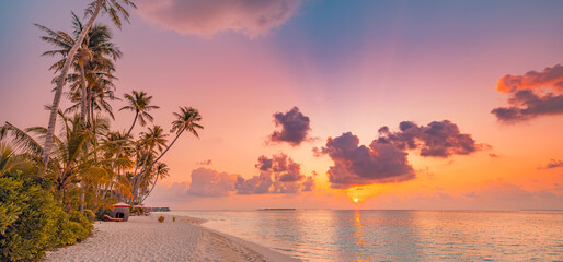 Majestic closeup view of calm sea water waves. Panoramic orange sunrise sunset sunlight. Tropical...