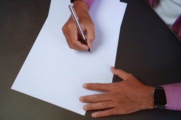 Man Holds a Pen and Ready to Write on Sheets of Paper, Writing Letter Concept
