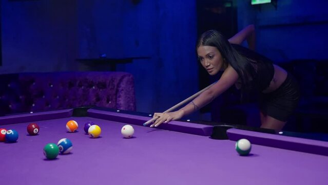 Lady In Black Skirt Engaged In A Game Of Pool