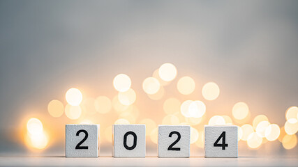 New Year 2024 coming. 2024 number on wooden block cubes