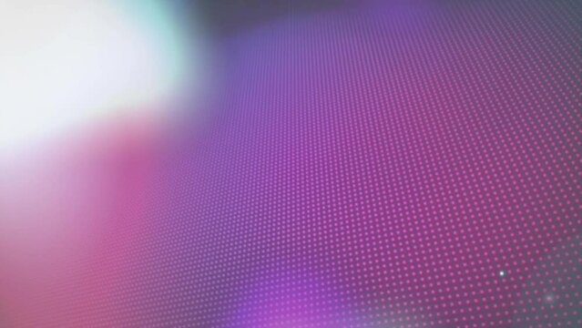 Animation of multicolored lens flares and dots over black background