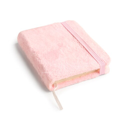Stylish notebook in pink plush cover isolated on white background