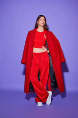 Fashion asian female model in red coat.