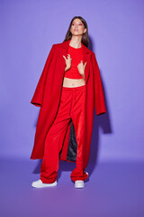 Fashion asian female model in red coat. - 651440611